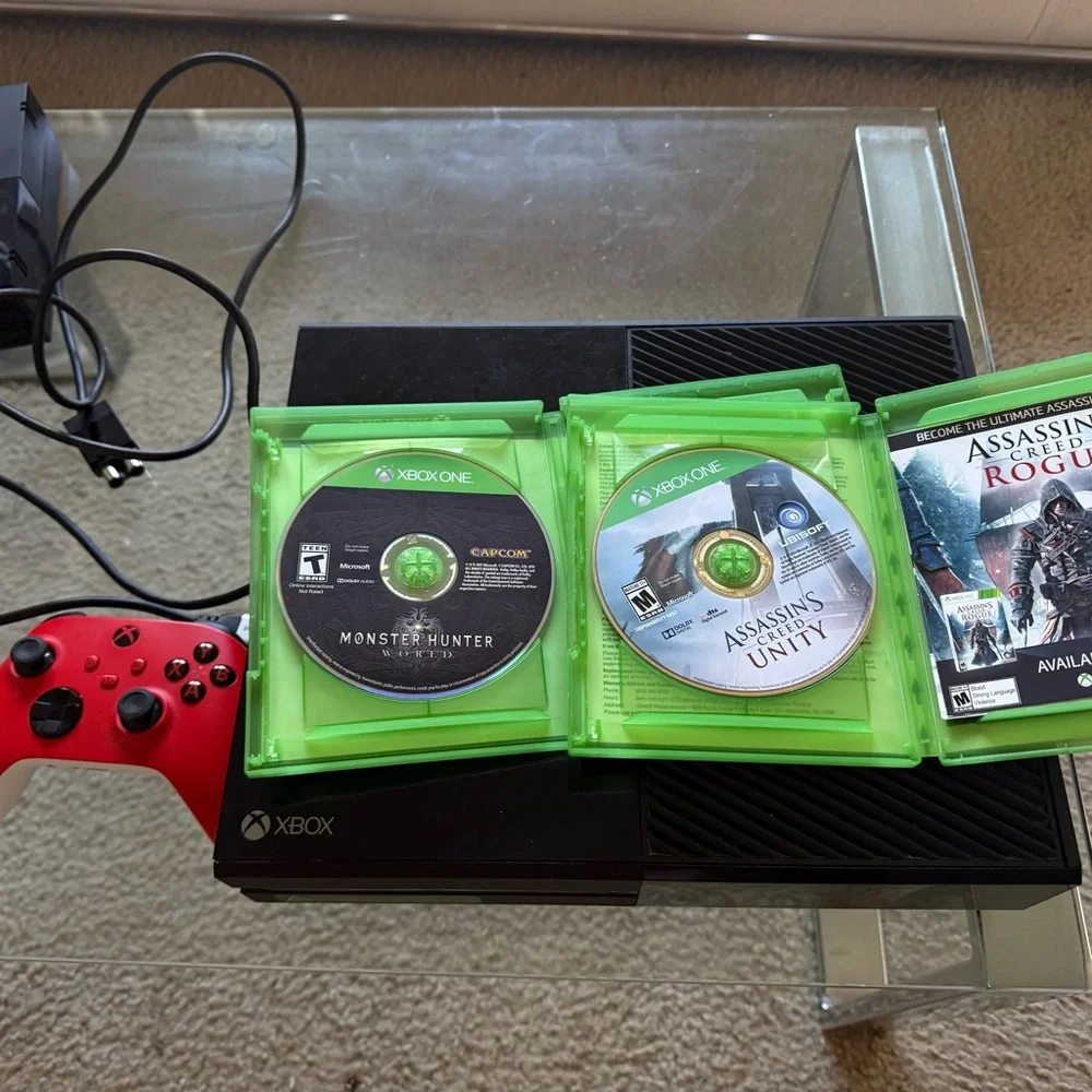 One Console with Red Controller and Games